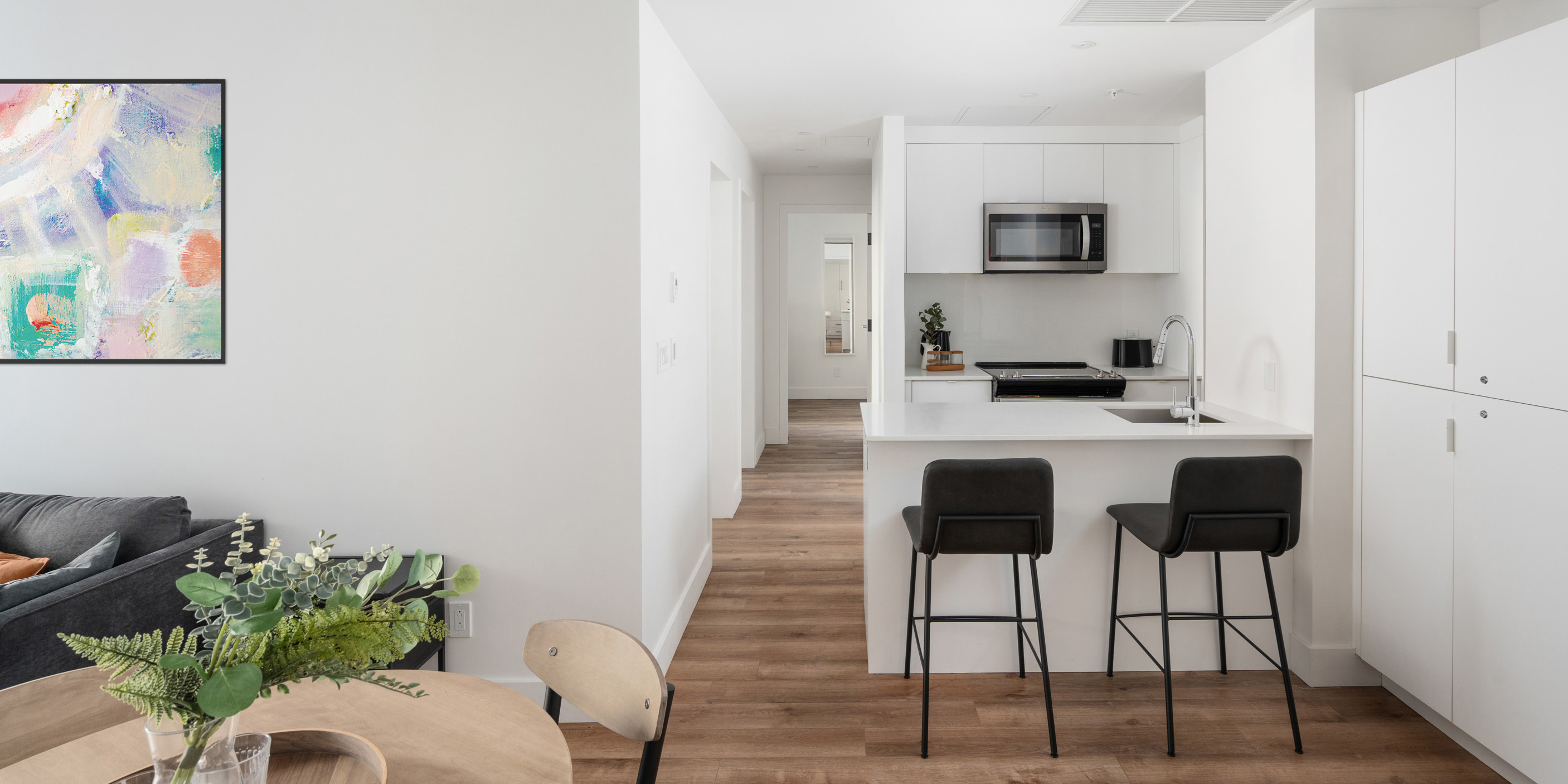 Kitchen and living area of student rental in Montreal